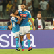 Napoli’s Lorenzo Insigne (L) and Kostas Manolas (R)